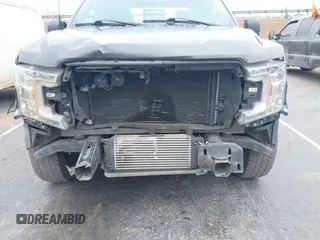 2018 Ford F-150 XL z VIN 1FTEW1CP1JKF15209, wystawiony jako IAAI lot #42048362 z przebiegiem 95 882 mil mil oraz . Historia ofert i sprzedaży dostępna na DreamBid. Obrazek 18.