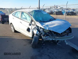 2019 Ford Fiesta SE z VIN 3FADP4BJ6KM130123, wystawiony jako IAAI lot #41247397 z przebiegiem 87 652 mil mil oraz . Historia ofert i sprzedaży dostępna na DreamBid. Obrazek 1.