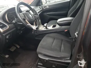 2015 Jeep Grand Cherokee Altitude with VIN 1C4RJFAG0FC209734, listed as a Copart auction lot 52973105 with 130,955 mi miles and Salvage Title. Bid and sale history available at carsss.com. Image 7.
