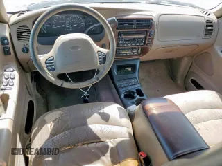 2001 Ford Explorer Limited z VIN 1FMZU65E31ZA00134, wystawiony jako Copart lot #56681575 z przebiegiem 176 524 mil mil oraz Tytuł czysty. Historia ofert i sprzedaży dostępna na DreamBid. Obrazek 8.