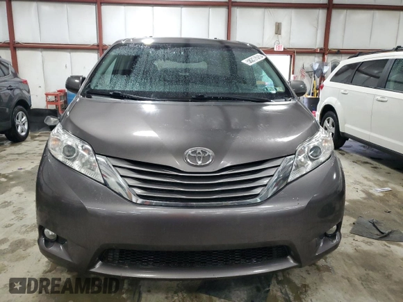 2015 Toyota Sienna XLE с VIN 5TDYK3DC4FS650605, выставлен на аукционе Copart как лот 58217575 с пробегом 174 364 миль миль и Списание • Salvage title. История ставок и продаж доступна на DreamBid. Изображение 5.