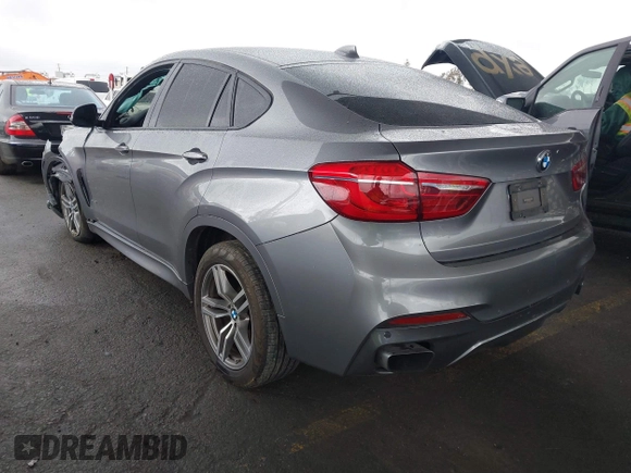 2016 BMW X6 xDrive50i with VIN 5UXKU6C59G0S82526, listed as a IAAI auction lot 41786622 with 110,796 mi miles and . Bid and sale history available at DreamBid. Image 3.