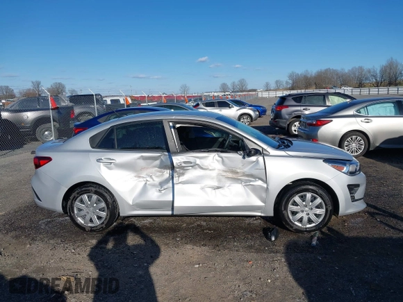 2023 Kia Rio LX with VIN 3KPA24ADXPE606463, listed as a IAAI auction lot 41728523 with 8,909 mi miles and . Bid and sale history available at DreamBid. Image 13.