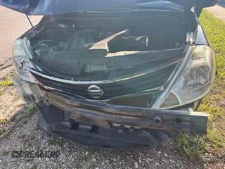 2010 Nissan Versa 1.6 with VIN 3N1CC1AP5AL391286, listed as a IAAI auction lot 42005172 with 33,441 mi miles. Bid and sale history available at carsss.com. Image 6.