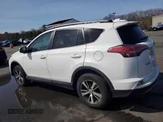 2018 Toyota RAV4 XLE with VIN 2T3WFREV4JW476959, listed as a Copart auction lot 51593265 with 198,596 mi miles and Salvage Title. Bid and sale history available at DreamBid. Image 2.