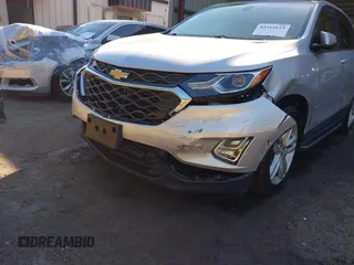 2019 Chevrolet Equinox LT z VIN 2GNAXKEV1K6189548, wystawiony jako IAAI lot #42315123 z przebiegiem 51 799 mil mil oraz . Historia ofert i sprzedaży dostępna na DreamBid. Obrazek 6.