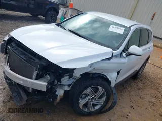 2022 Hyundai Santa Fe SE z VIN 5NMS14AJ9NH442383, wystawiony jako IAAI lot #41498596 z przebiegiem Nie podano mil oraz . Historia ofert i sprzedaży dostępna na DreamBid. Obrazek 17.