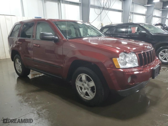 2007 Jeep Grand Cherokee Laredo with VIN 1J8GR48K27C687033, listed as a Copart auction lot 52401165 with 135,146 mi miles and Salvage Title. Bid and sale history available at carsss.com. Image 4.