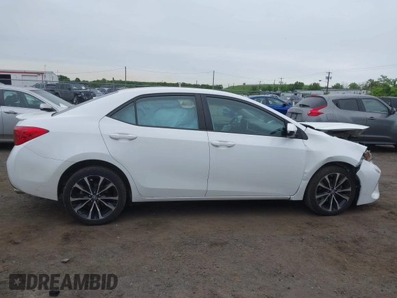 2017 Toyota Corolla L z VIN 2T1BURHE8HC787010, wystawiony jako IAAI lot #42366723 z przebiegiem 104 805 mil mil oraz . Historia ofert i sprzedaży dostępna na DreamBid. Obrazek 13.