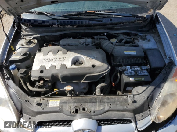 2007 Hyundai Accent SE z VIN KMHCN36C47U027122, wystawiony jako Copart lot #52224605 z przebiegiem 169 022 mil mil oraz Szkoda całkowita • Salvage title. Historia ofert i sprzedaży dostępna na DreamBid. Obrazek 11.