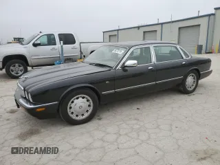 1999 Jaguar XJ z VIN SAJKD6043XC872105, wystawiony jako Copart lot #86270724 z przebiegiem Nie podano mil oraz Szkoda całkowita • Salvage title. Historia ofert i sprzedaży dostępna na DreamBid. Obrazek 1.