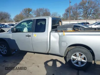 2004 Nissan Titan SE with VIN 1N6AA06A74N553025, listed as a IAAI auction lot 41466773 with 182,110 mi miles. Bid and sale history available at carsss.com. Image 14.