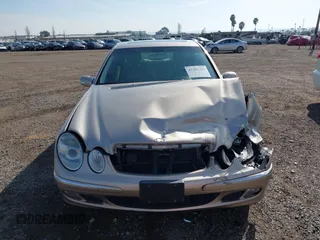2005 Mercedes-Benz E-Class 3.2L with VIN WDBUF65J05A706096, listed as a IAAI auction lot 41482289 with 110,531 mi miles. Bid and sale history available at carsss.com. Image 12.