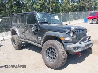 2018 Jeep Wrangler Unlimited Sport S z VIN 1C4HJXDN1JW216825, wystawiony jako IAAI lot #42405799 z przebiegiem 37 194 mil mil oraz . Historia ofert i sprzedaży dostępna na DreamBid. Obrazek 1.