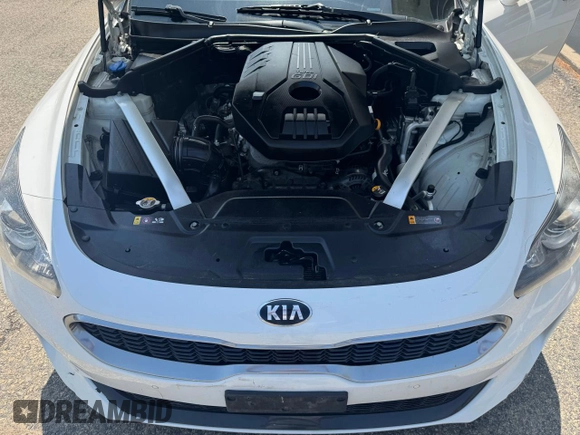2018 Kia Stinger with VIN KNAE15LA7J6031245, listed as a Copart auction lot 55879285 with 144,020 mi miles and Clean Title. Bid and sale history available at carsss.com. Image 7.