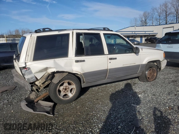 1996 Jeep Grand Cherokee Laredo with VIN 1J4EX58S3TC110154, listed as a Copart auction lot 46947805 with 268,507 mi miles and Salvage Title. Bid and sale history available at carsss.com. Image 3.