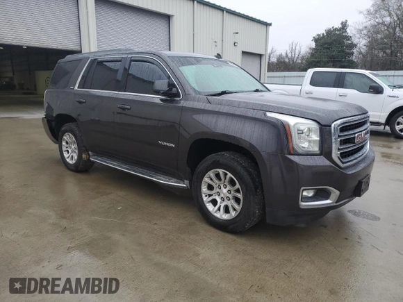 2015 GMC Yukon SLT with VIN 1GKS1BKC9FR278056, listed as a Copart auction lot 44989505 with 205,885 mi miles and Salvage Title. Bid and sale history available at carsss.com. Image 4.