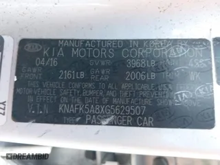 2016 Kia Forte 5-Door LX with VIN KNAFK5A8XG5629507, listed as a IAAI auction lot 42098605 with 140,627 mi miles. Bid and sale history available at carsss.com. Image 9.