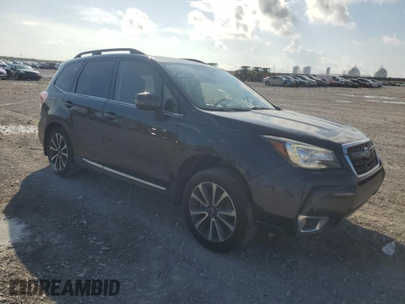 2017 Subaru Forester Touring with VIN JF2SJGWC5HH482107, listed as a Copart auction lot 60975725 with 71,889 mi miles and Salvage title. Bid and sale history available at DreamBid. Image 4.