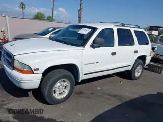1999 Dodge Durango z VIN 1B4HS28Y1XF619973, wystawiony jako IAAI lot #42399672 z przebiegiem 192 812 mil mil oraz . Historia ofert i sprzedaży dostępna na DreamBid. Obrazek 12.