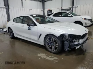 2022 BMW 8 Series 840i with VIN WBAGV4C06NCH11761, listed as a Copart auction lot 79094614 with 37,994 mi miles and Salvage title. Bid and sale history available at DreamBid. Image 4.