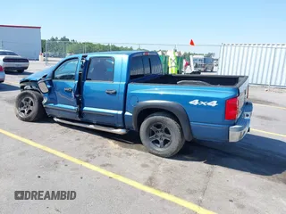 2005 Dodge Dakota SLT with VIN 1D7HW48N05S319621, listed as a IAAI auction lot 42037140 with 251,595 mi miles and . Bid and sale history available at DreamBid. Image 3.