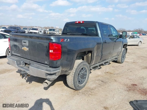 2018 Chevrolet Silverado 2500HD LT with VIN 1GC1KVEY7JF136571, listed as a IAAI auction lot 41520357 with 164,750 mi miles. Bid and sale history available at carsss.com. Image 4.