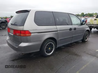 2000 Honda Odyssey LX z VIN 2HKRL1857YH570211, wystawiony jako IAAI lot #42139263 z przebiegiem 161 983 mil mil oraz . Historia ofert i sprzedaży dostępna na DreamBid. Obrazek 4.
