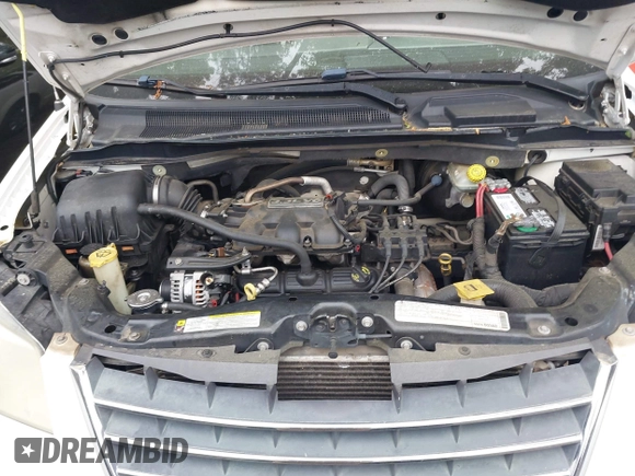 2009 Chrysler Town & Country LX with VIN 2A8HR44E39R606779, listed as a IAAI auction lot 42059256 with 177,228 mi miles and . Bid and sale history available at DreamBid. Image 10.