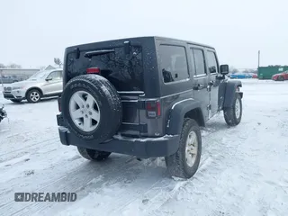 2016 Jeep Wrangler Unlimited Rubicon with VIN 1C4BJWFG7GL192698, listed as a IAAI auction lot 41603236 with 69,620 mi miles. Bid and sale history available at carsss.com. Image 4.