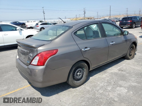 2016 Nissan Versa S with VIN 3N1CN7AP0GL803412, listed as a Copart auction lot 64677645 with 96,788 mi miles and Salvage title. Bid and sale history available at DreamBid. Image 3.