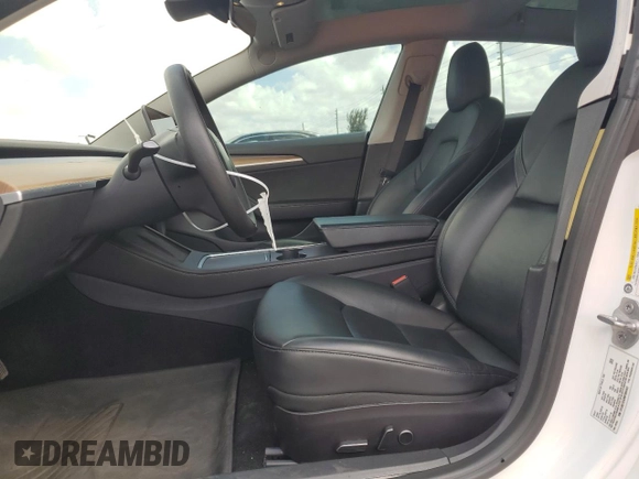 2021 Tesla Model 3 Standard Range Plus with VIN 5YJ3E1EA2MF985463, listed as a Copart auction lot 53311455 with 23,176 mi miles and Clean Title. Bid and sale history available at DreamBid. Image 7.