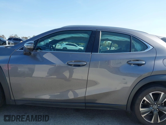 2019 Lexus UX with VIN JTHY3JBH6K2002909, listed as a IAAI auction lot 41980292 with 28,964 mi miles. Bid and sale history available at carsss.com. Image 14.