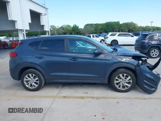 2021 Hyundai Tucson SE with VIN KM8J23A48MU379826, listed as a IAAI auction lot 41887834 with 51,885 mi miles and . Bid and sale history available at DreamBid. Image 14.