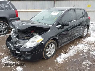 2009 Nissan Versa 1.8 SL with VIN 3N1BC13E49L427102, listed as a IAAI auction lot 41553357 with 133,300 mi miles. Bid and sale history available at carsss.com. Image 17.
