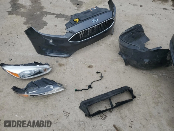 2017 Ford Focus SE с VIN 1FADP3F29HL267516, выставлен на аукционе Copart как лот 56984255 с пробегом 98 861 миль миль и Списание • Salvage title. История ставок и продаж доступна на DreamBid. Изображение 12.