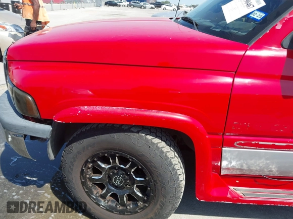1999 Dodge 1500 z VIN 1B7HC13Z3XJ522717, wystawiony jako IAAI lot #41990467 z przebiegiem 146 472 mil mil oraz . Historia ofert i sprzedaży dostępna na DreamBid. Obrazek 13.