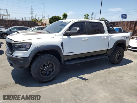 2022 Ram 1500 TRX with VIN 1C6SRFU9XNN215610, listed as a Copart auction lot 59362484 with 23,904 mi miles and Salvage title. Bid and sale history available at DreamBid. Image 1.