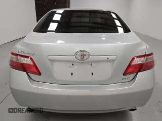 2009 Toyota Camry LE z VIN 4T1BK46K89U595880, wystawiony jako Copart lot #55069935 z przebiegiem 265 831 mil mil oraz Czysty tytuł • Clean title. Historia ofert i sprzedaży dostępna na DreamBid. Obrazek 6.