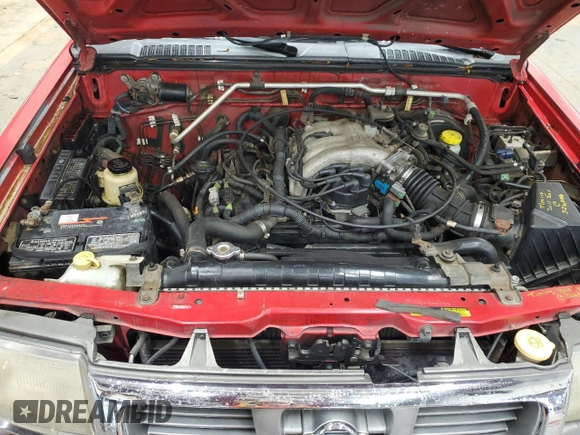 1999 Nissan Frontier XE with VIN 1N6ED26Y5XC308158, listed as a Copart auction lot 84320904 with 316,532 mi miles and Clean title. Bid and sale history available at DreamBid. Image 11.