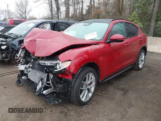 2019 Alfa Romeo Stelvio Ti z VIN ZASPAKBNXK7C31621, wystawiony jako IAAI lot #41773366 z przebiegiem 37 344 mil mil oraz . Historia ofert i sprzedaży dostępna na DreamBid. Obrazek 2.