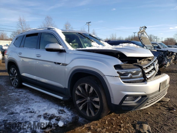 2019 Volkswagen Atlas SEL Premium with VIN 1V2NR2CAXKC582684, listed as a Copart auction lot 83217524 with 127,821 mi miles and Salvage title. Bid and sale history available at DreamBid. Image 4.