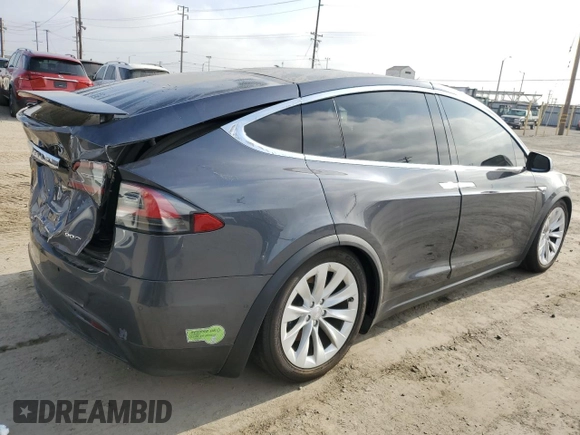 2016 Tesla Model X 70D with VIN 5YJXCAE2XGF001562, listed as a Copart auction lot 53539225 with 73,274 mi miles and Salvage Title. Bid and sale history available at DreamBid. Image 3.