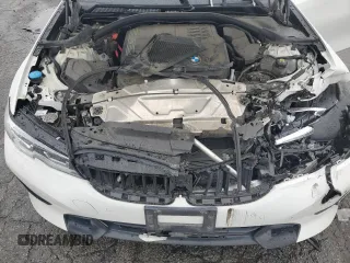 2021 BMW 3 Series 330i with VIN 3MW5R1J0XM8B48990, listed as a Copart auction lot 49277185 with 69,776 mi miles and Salvage Title. Bid and sale history available at carsss.com. Image 12.