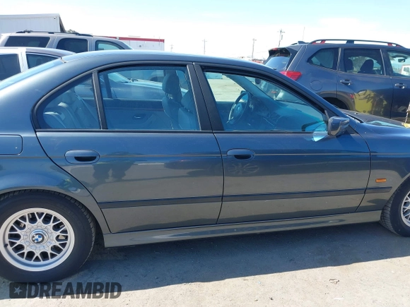 2000 BMW 5 Series 528iA with VIN WBADM6343YGV01651, listed as a IAAI auction lot 41745574 with 143,898 mi miles. Bid and sale history available at carsss.com. Image 13.