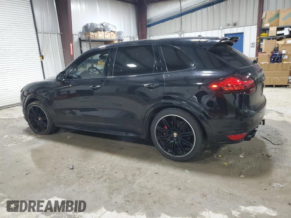 2012 Porsche Cayenne Turbo z VIN WP1AC2A21CLA84144, wystawiony jako Copart lot #82688294 z przebiegiem 124 143 mil mil oraz Szkoda całkowita • Salvage title. Historia ofert i sprzedaży dostępna na DreamBid. Obrazek 2.
