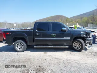 2010 GMC Sierra 1500 SLT with VIN 3GTRCWE09AG122055, listed as a IAAI auction lot 42064233 with 266,560 mi miles and . Bid and sale history available at DreamBid. Image 13.