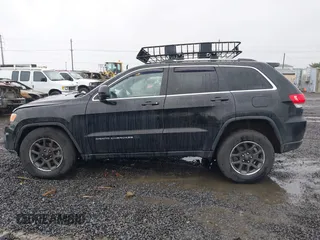 2015 Jeep Grand Cherokee Laredo with VIN 1C4RJFAGXFC602544, listed as a IAAI auction lot 41504666 with 190,170 mi miles. Bid and sale history available at carsss.com. Image 14.