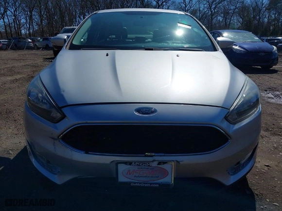 2015 Ford Focus SE with VIN 1FADP3F28FL292663, listed as a IAAI auction lot 41865686 with 999,999 mi miles. Bid and sale history available at carsss.com. Image 6.