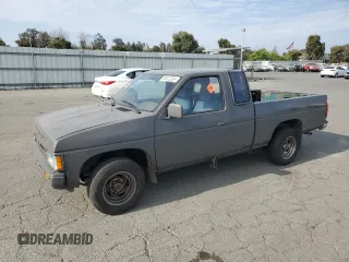 1989 Nissan Hardbody z VIN 1N6ND16S2KC377484, wystawiony jako Copart lot #65412324 z przebiegiem 31 573 mil mil oraz Szkody całkowita. Historia ofert i sprzedaży dostępna na DreamBid. Obrazek 1.